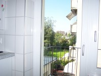 /album/fotogalerie-wohnung-5-1-og-li-/door-to-balcony-with-view-from-kitchen-jpg/